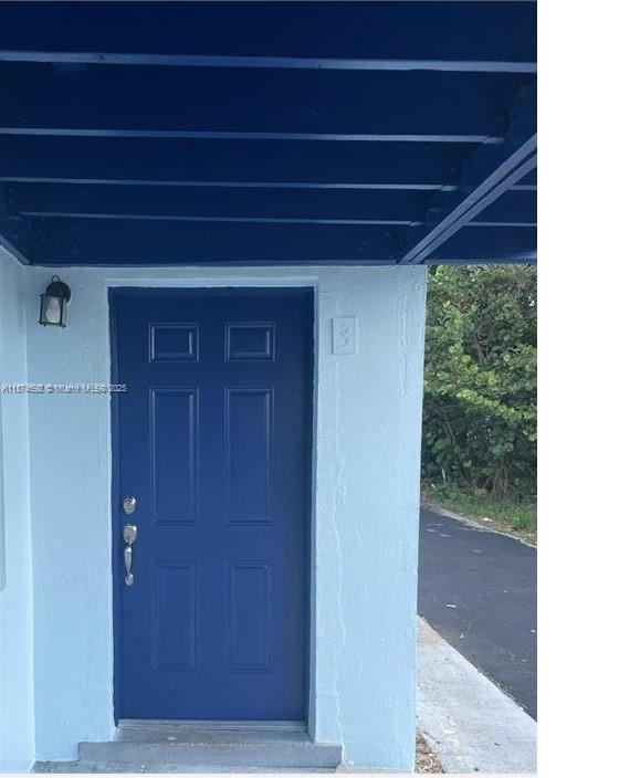 This 2 bedroom/1 bath unit situated on a very quiet street in the heart of WEST PALM, leaves you close to schools,public transportation and close to downtown. Unit is freshly painted and recently updated with new flooring and Appliances. Situated in a quiet tri-plex setting, this unit offers the perfect balance of privacy and community, making it a great choice for singles, couples, or small families seeking an inviting place to call home.