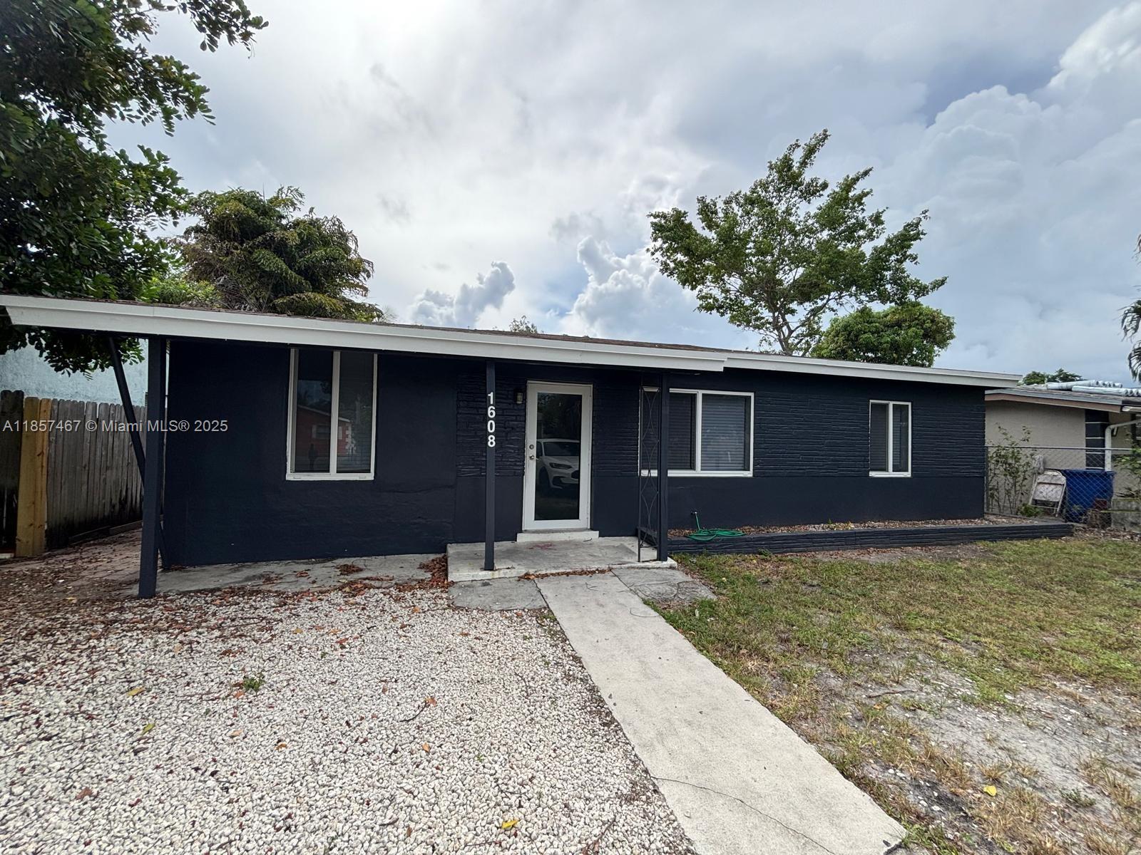 Beautifully updated & freshly painted 3-bedroom, 2-bath home in the sought-after Progresso neighborhood. Equipped with Brand New Shaker Cabinets, quartz countertop and Stainless Steel Appliances. A stackable washer and dryer is also included. Central AC and Ceilings Fans throughout the House. Terrazzo & Ceramic Floors - One of the bedrooms features a private entrance and bathroom — ideal for guests, in-law quarters, or rental income potential. Flooded with natural light offering plenty of room to expand. Completely fenced private backyard provides the perfect setting for relaxing and entertaining while leaving plenty of room to build a pool and backyard oasis. Conveniently located just minutes from Wilton Manors, Downtown Fort Lauderdale, Las Olas, the beach, shopping, dining, and more.