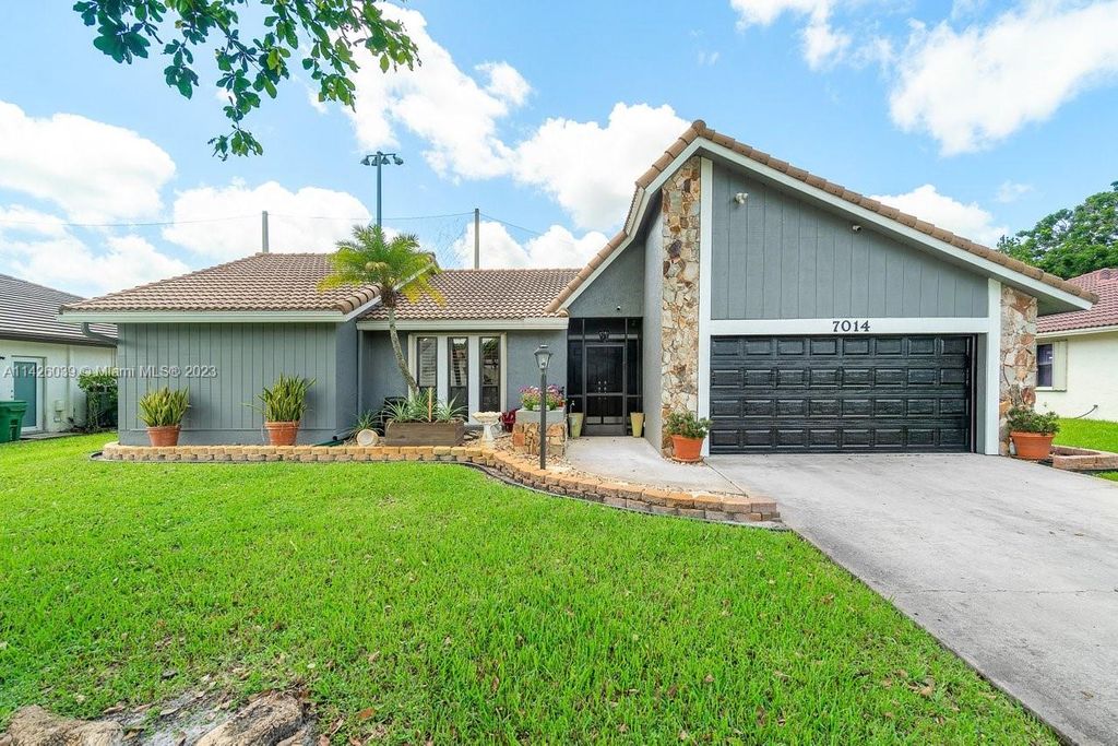 Photo of 7014 NW 38th St, Coral Springs, FL 33065 (MLS # A11426039)