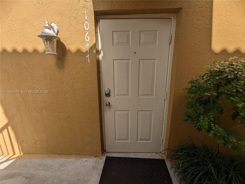 Photo of 10677 NW 45th St #10677, Coral Springs, FL 33065 (MLS # A11994133)