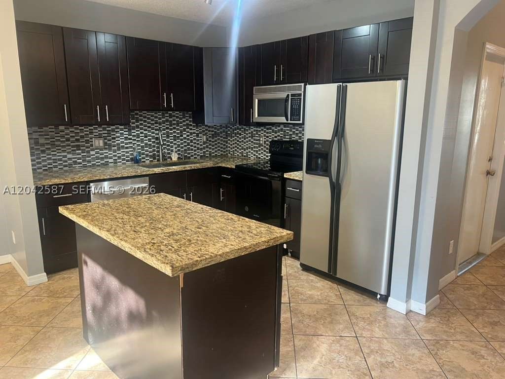 Photo of 2825 SW 127th Way, Miramar, FL 33027 (MLS # A12042587)
