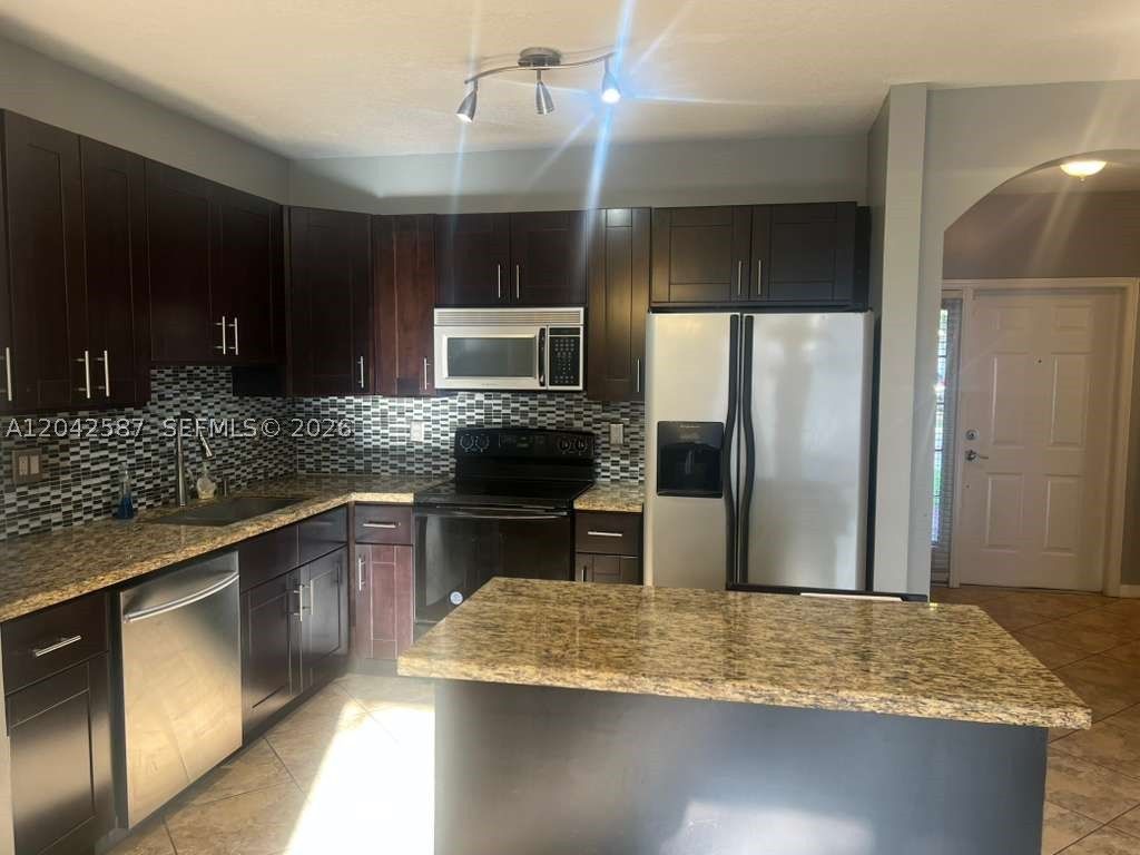 Photo of 2825 SW 127th Way, Miramar, FL 33027 (MLS # A12042587)