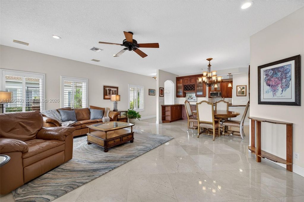 Photo of 1012 SW 42nd Ave, Deerfield Beach, FL 33442 (MLS # A11990403)