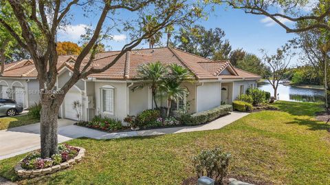 Photo of 1012 SW 42nd Ave, Deerfield Beach, FL 33442 (MLS # A11990403)