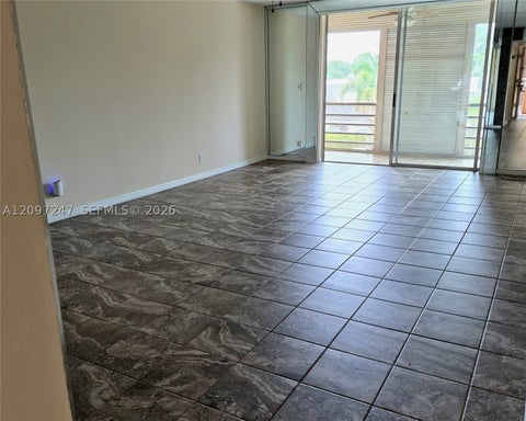 Photo of 403 NW 68th Ave #309, Plantation, FL 33317 (MLS # A12097247)