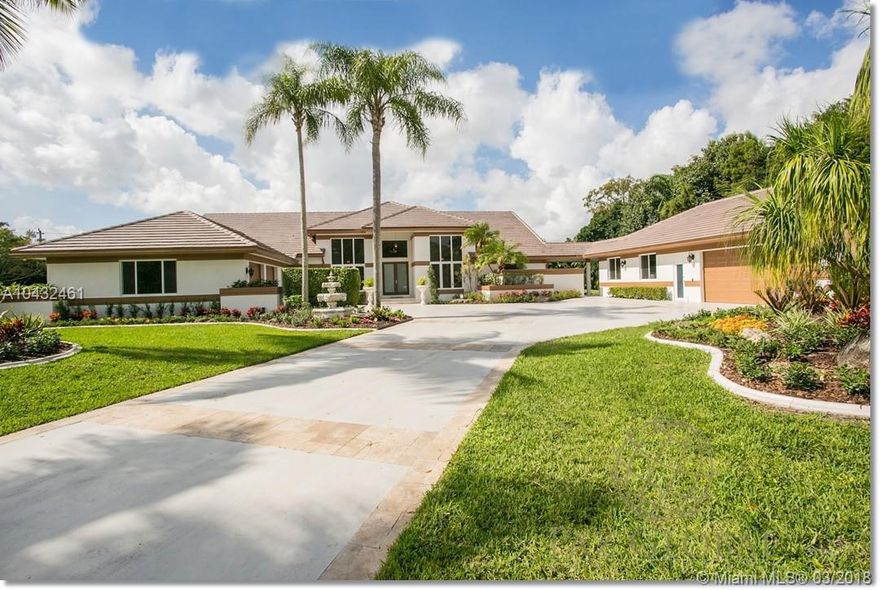 Amazing 5/5.5, 4+ cars garage, pool/spa, private yard & 1/1 guest house w/wet bar/kitchen & outside patio. Main house family room has stunning wall unit feature w/fire place, master has his & hers dressing areas, California closets. Baths has floating tub & glass enclosed shower. New kitchen w/granite counters, mosaic glass backsplash & new SS appliances. French doors throughout, outdoor kitchen & patio. Guest house has bedroom, full bath, living room, kitchen area & an outside patio. New windows & roof. Professionally staged w/furniture.