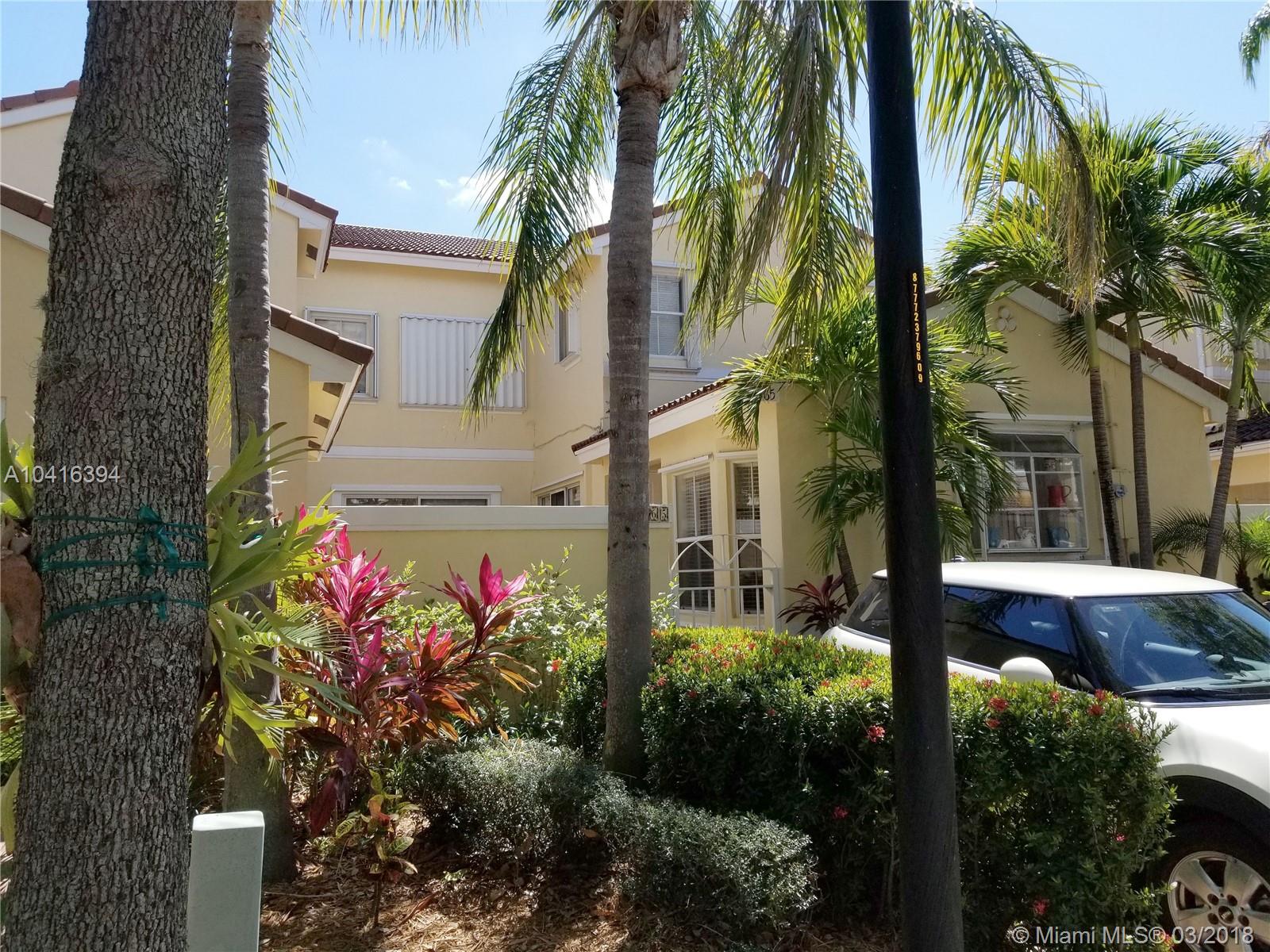 A gorgeous townhouse in West Lake Village in excellent condition. Kitchen with granite counter tops and stainless steel appliances. Tiled downstairs, hardwood flooring upstairs. Jacuzzi tub. Washer and dryer. Fee Simple town house community is Guard Gated 24/7. Amenities include a swimming pool, tennis courts, gym and a kids playground area. Located just 1 mile from the sandy Hollywood beaches. Unit with 2 OPEN parking spaces in front of the house(No closed Garage). A turnkey home!! Call Today!