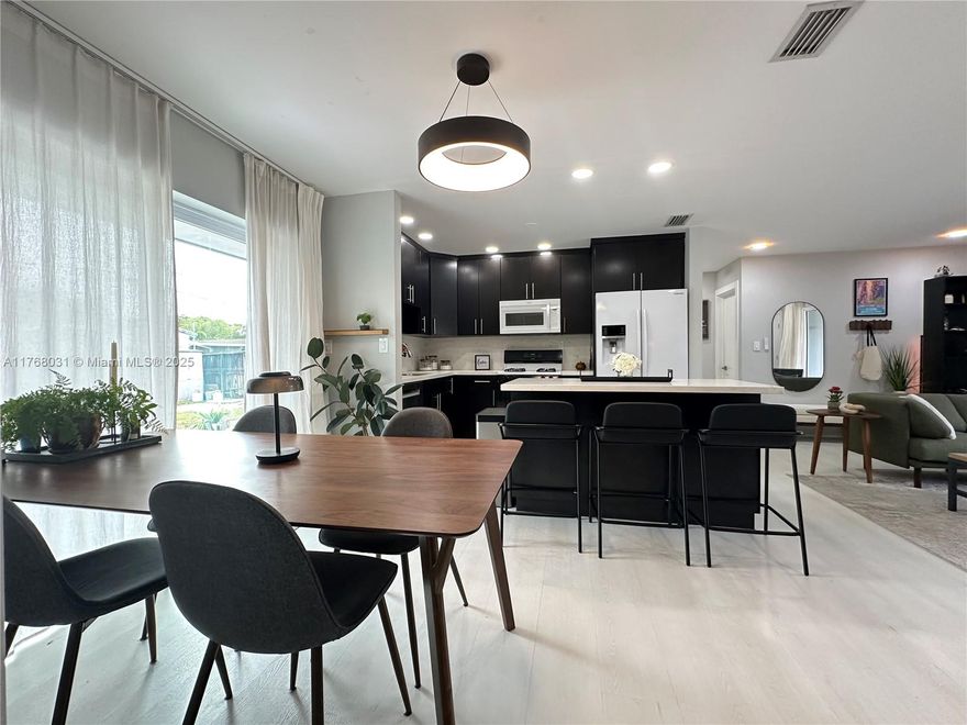 Fall in LOVE w/this FULLY Renovated Home’s CONTEMPORARY tones & Open Concept Design in idyllic Hollywood Heights--just 4 mi to Hollywood BEACH! Plus Seller just IMPROVED PRICE! It’s STYLISH Kitchen boasts eat-in island, quartz counters w/seamless backsplash, LED lights & 2023 Bosch dishwasher. MODERN fixtures, paneled doors, DESIGNER baths w/relaxing rain showerhead, fully FENCED lot w/extra wide gate, circular driveway, 2018 Roof, 2023 AC & many EXTRAS…must see to appreciate! Enjoy savings of GAS WH (2023) + stove, IMPACT windows/front & slider doors and NO HOA. Walk to schools, Farmer’s Market & beautiful TY Park. THRIVE w/ENDLESS CHOICES of dining/Aventura Mall/Memorial Hospital/I-95/FLL/MIA just min away. Perfect blend of Tranquility AND Convenience! Book appt NOW!