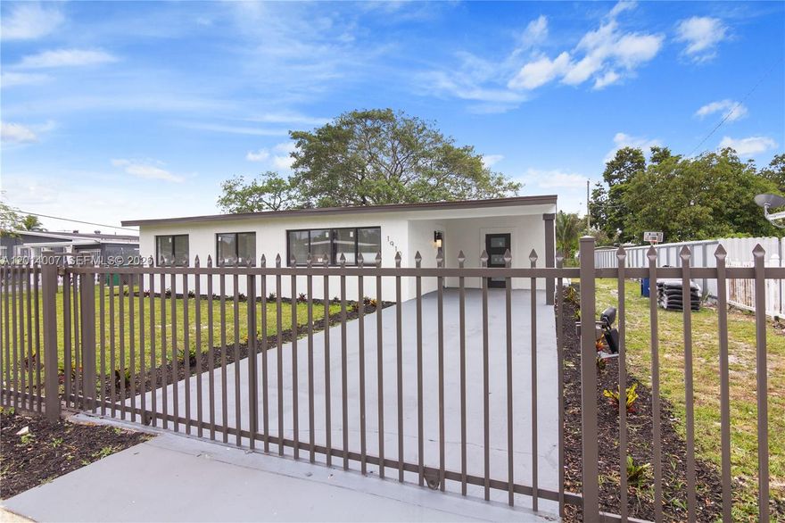 Completely renovated from top to bottom with permits, this exceptional 3-bedroom, 1 & 1/2 bath residence offers modern living, and total peace of mind. Every detail has been thoughtfully updated, including a brand-new kitchen, fully remodeled bathrooms, new flooring throughout, designer lighting fixtures, custom moldings, and new interior and exterior doors. The home also features new windows and a new roof, providing long-term durability and energy efficiency. Major system upgrades were completed as part of the renovation, including a new electrical panel, electrical update, and entirely new plumbing with updated supply lines and drain system—everything professionally completed with permits. This property offers the confidence of owning a home where both visible finishes and critical infrastructure have been completely renewed. A spacious terrace extends the living area, creating an ideal setting for entertaining, dining, or relaxing outdoors. The oversized backyard offers exceptional space and flexibility, perfect for gatherings, outdoor living, future expansion, or creating a private outdoor oasis. The home comes fully equipped with brand-new appliances, including a washer and dryer, making it truly move-in ready. With no detail overlooked, this residence feels like a brand-new home while offering the benefits of an established neighborhood. A rare opportunity to own a turnkey property where all the work has been completed with quality, care, and permits.