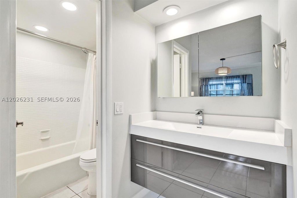 Photo of 450 Paradise Isle Blvd #204, Hallandale Beach, FL 33009 (MLS # A12026231)