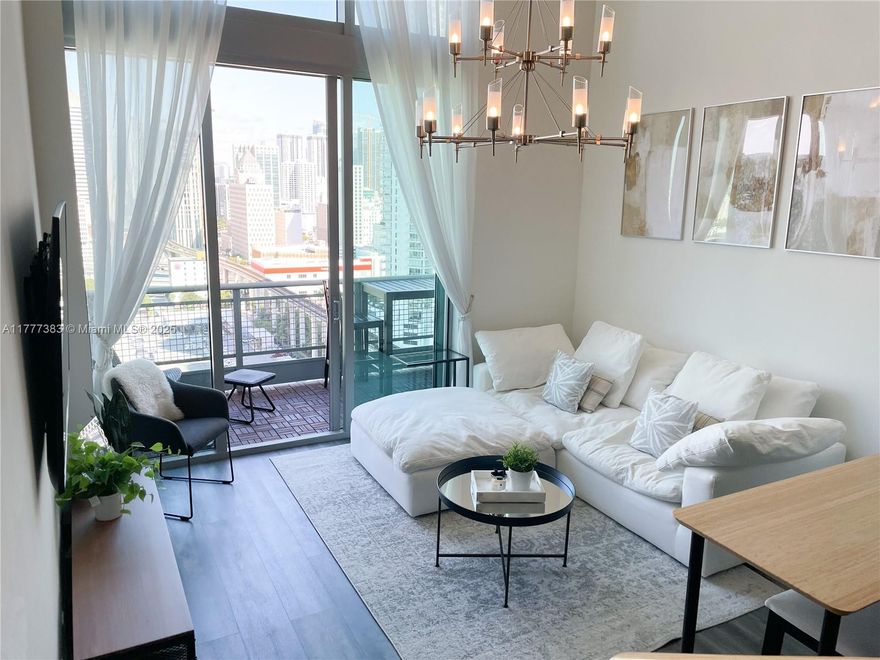 Available now: waterfront, remodeled, fully-furnished, 2-story condo with 2 bedroom and 2.5 bathrooms in the heart of Brickell. New appliances and hardwood floors. Water and city views from the 2 balconies. Extra-large King bed in the master and en-suite bath with double vanity. The second bedroom is loft-style with daybed/queen bed & full bathroom. Smart TVs in living room & bedroom. 2 Parking spaces included. Amenities: pickleball & basketball court, pool, fitness center, sauna, party room, EV charging, waterfront restaurant & boardwalk and a cross fit gym. Water & furniture included in rent, close distance from 50+ restaurants, shops, parks. 6 -month lease minimum, available now. video tour available.