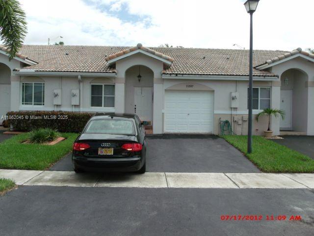 Beautiful and spotless villa ready for immediate occupancy! This home features an open floor plan with ceramic tile flooring throughout and a fresh coat of paint, creating a bright and inviting space. The property includes a one-car garage with two additional parking spaces and adequate guest parking. Located in a well-maintained, gated, and very secure community, this home is close to excellent schools, shopping, and major transportation routes. The owner is seeking non-smokers with a good background to make this their happy home. The HOA requires a credit score of 650+ with no prior evictions. Owner requires also application through https://apply.link/1YwpfLA