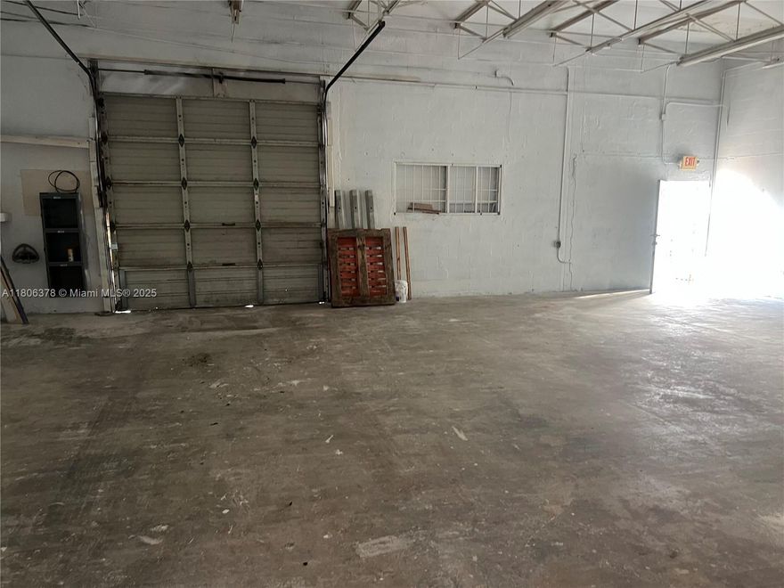 Great opportunity! Discover an exceptional industrial space in the heart of the vibrant Leah Arts District. The warehouse is equipped with a roll-up door. This 1,200-square-foot warehouse features high ceilings and an open-concept layout, with three entrances that provide flexible access and functionality. It is designed for efficiency and convenience and is suitable for storage, distribution, or light manufacturing. The expansive floor plan has a high clearance, allowing for tall racking or equipment. Durable concrete flooring and steel structure make it ideal for heavy-duty use. The property also includes one private bathroom and an outdoor storage area for additional space. The building is in the heart of Hialeah, directly across from the famous shopping center, Flamingo Plaza.