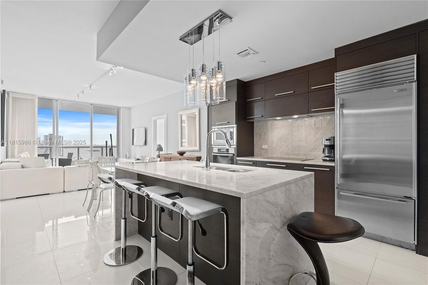 Luxury living in the heart of Downtown Miami at 900 Biscayne Bay. This elegantly fully furnished 3-bedroom, 3-bathroom residence offers a private elevator entrance and spans 1,450 LA SQ FT of light-filled living space. Originally designed as a 2-bedroom + Den, in which it has been thoughtfully enclosed to provide additional comfort and privacy, perfect for guests, a home office, or a growing family. Enjoy a sleek open-concept kitchen, a spacious balcony with Bay views, and floor-to-ceiling windows that bring lots of natural light. Indulge in 5-Star amenities: fitness center, full-service spa, two resort-style pools, sauna, massage rooms, and 24-hour concierge and valet service. Live steps from Miami’s cultural and entertainment epicenter with unmatched convenience and lifestyle.