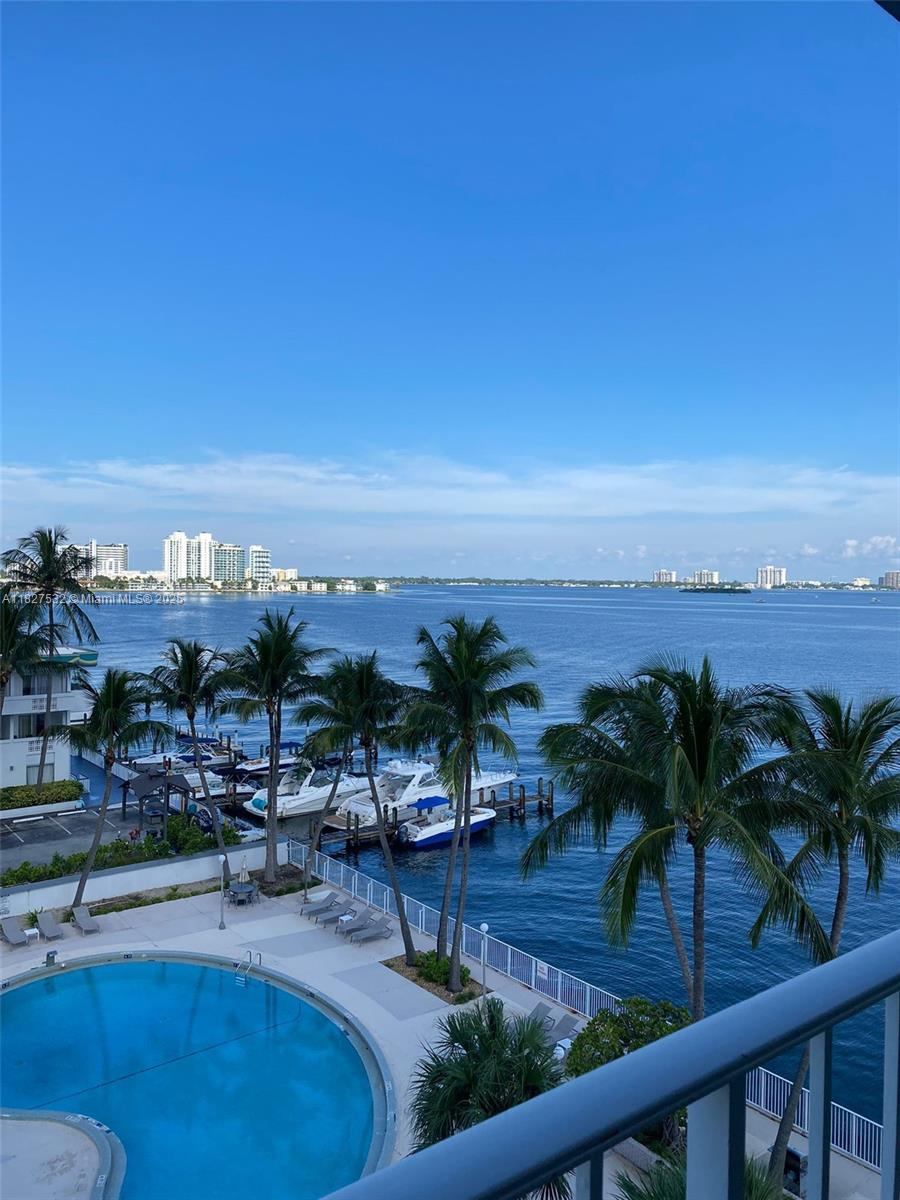 Amazing sun sets from the balcony of this split bedroom apartment. Furnished, tile floors, 1 parking space, laundry facilities on each floor. Located in a full-service building with a pool on the bay & a new gym. Close to the airport, beach, restaurants, shops, main highways, universities, & hospitals.