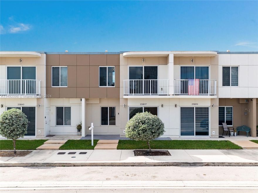 Explore modern living in this 4-bed, 3.5-bath townhome, built with solid concrete construction, impact windows & doors. The open kitchen features SS appliances, quartz countertops, wood cabinets and LED lighting, connecting seamlessly to the living & dining spaces. Also on the ground level, a primary bedroom with en suite bath, private exit door, fenced yard with new paver patio and two parking spaces.

Upstairs is a second primary bedroom with en suite, balcony and walk-in closet, along with two additional bedrooms and a remodeled bathroom. New custom blinds, interior and exterior front painting and pressure washing.  Wired for an alarm and home automation, this home balances style with smart living. Meticulously designed, it's your ideal home blending technology, style, and comfort!
