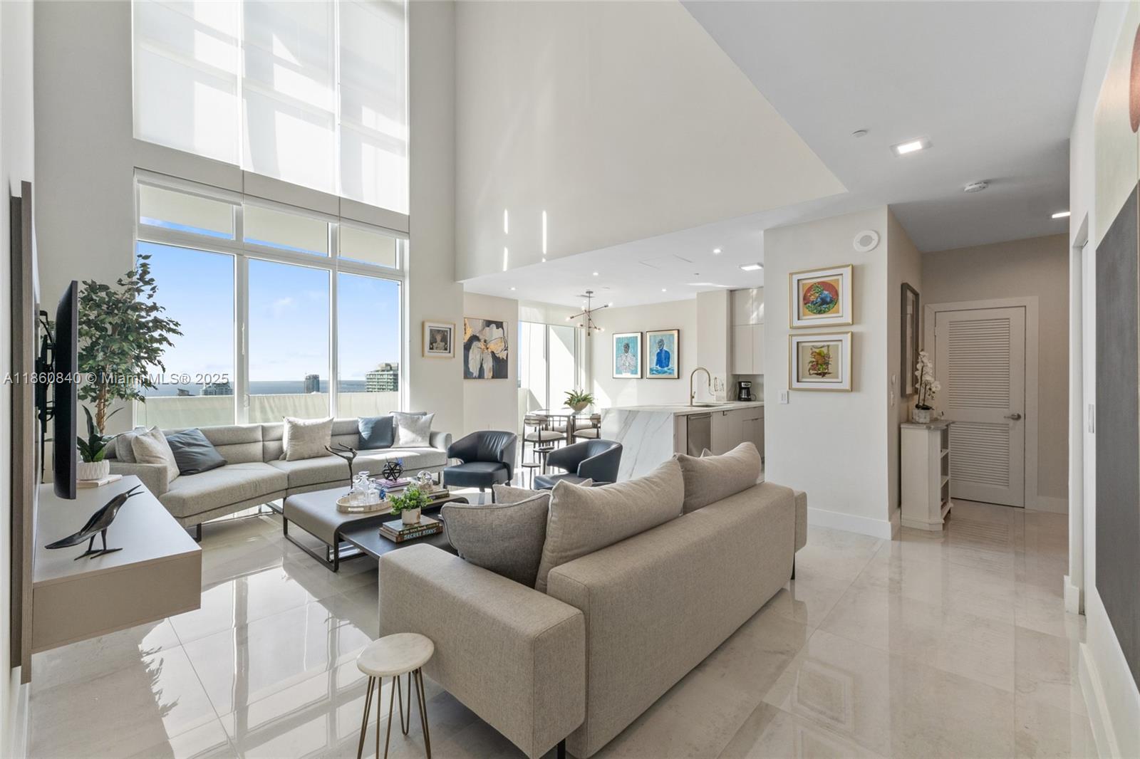 Furnished and fully renovated dream penthouse at 950 Brickell Bay Drive. This 3-bedroom, 3-bathroom residence offers 1,763 square feet of luxurious living space with breathtaking bay and Intracoastal views. Enjoy the fully renovated open kitchen with granite countertops and stainless steel appliances, perfect for entertaining. The spacious layout has high ceilings and ceramic floors, creating an inviting atmosphere. Relax in style with amenities like a door attendant and valet parking. Stay active in the on-site gym or unwind in the billiards room. With covered and assigned parking, convenience is at your doorstep. Experience the best of Miami high-rise living with water views. It can be rented short-term, for a minimum of 3 months and a maximum of 5months, starting December.