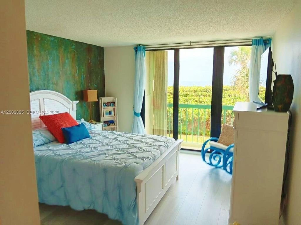 Photo of 9900 S Ocean Dr #106, Jensen Beach, FL 34957 (MLS # A12000805)