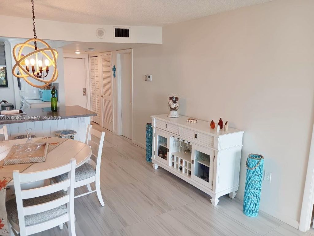 Photo of 9900 S Ocean Dr #106, Jensen Beach, FL 34957 (MLS # A12000805)