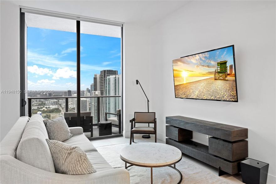 Gorgeous, fully furnished residence located on the highest floors of Gale Hotel & Residences. This bright 1-bedroom features an expansive living area with a dedicated dining space, and a private terrace showcasing stunning views of Downtown Miami’s skyline. Includes a premium Restoration Hardware furniture package.

The residence offers an elegant, modern kitchen with custom cabinetry and high-end European appliances, along with in-unit washer, dryer, and dishwasher.

Enjoy resort-style amenities in a prime location, just steps from Bayside Marketplace and Bayfront Park, and within walking distance to the best of Miami’s vibrant lifestyle. Short-term rentals permitted—an exceptional opportunity for investors.
