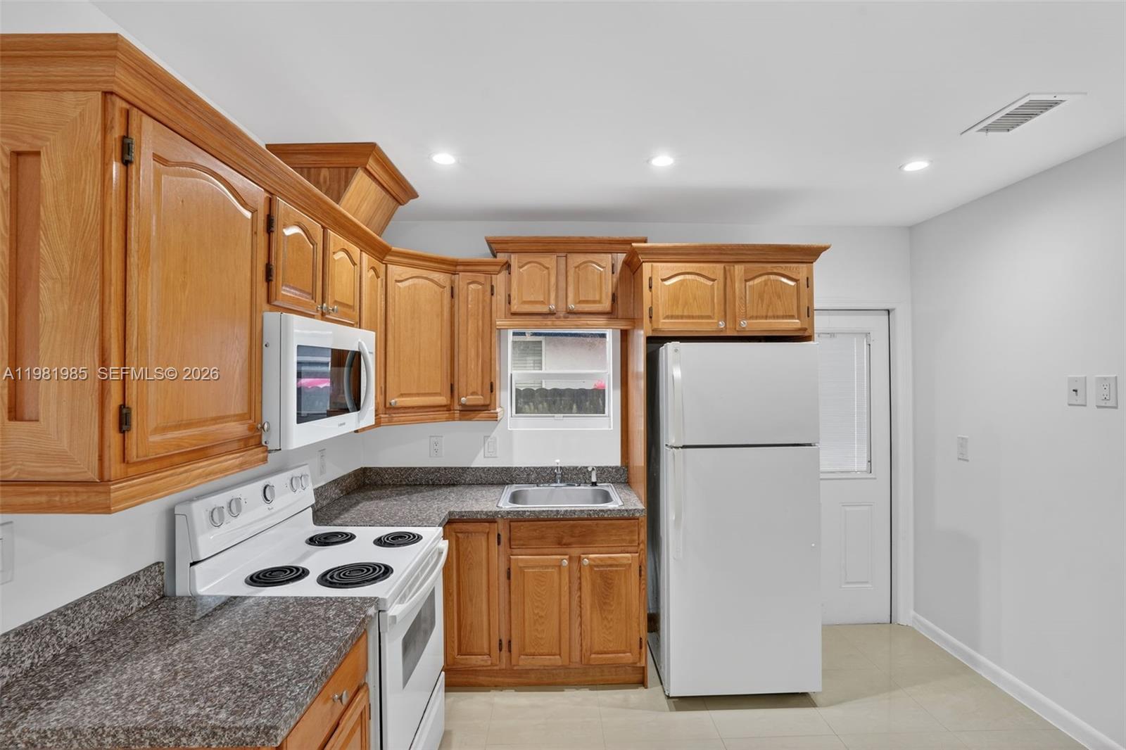 TAMIAMI CITY REVISED - Residential Lease