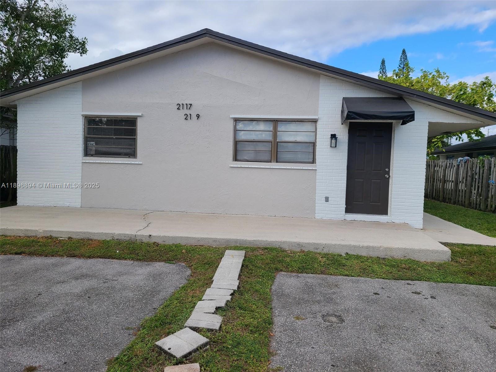 Hollywood 2/1 duplex, spacious unit with large kitchen, central a/c, tiled throughout, freshly painted exterior. two designated parking spaces. rent includes water/garbage. NEW IMPACT WINDOWS on order and to be installed. landlord will require offer package to include full credit reports, background checks, proof of income.