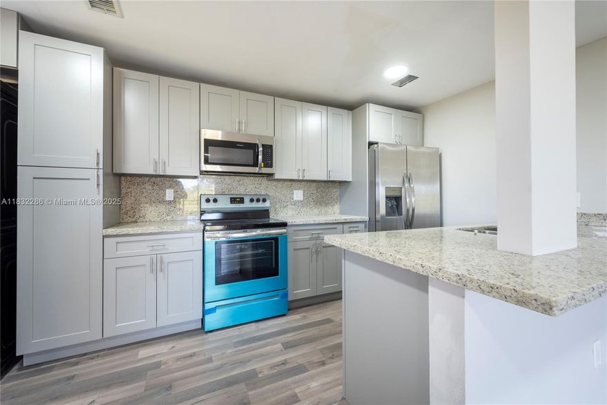 Beautiful 2 bedroom 2 bathroom corner unit with 2 balconies. Tile flooring throughout, wood cabinets in kitchen, stainless steel appliances, and granite counter tops. Water, Garbage and Sewer is included in the rent. Community has pool, bbq area and fenced in open court. Centrally located close to major highways.