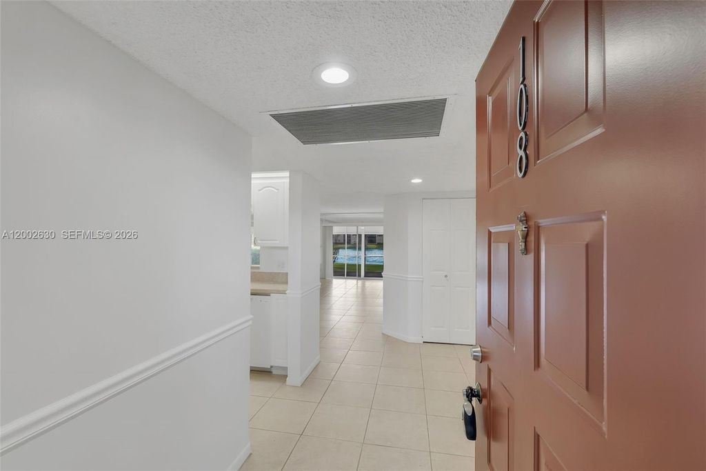 Photo of 850 SW 138th Ave #108D, Pembroke Pines, FL 33027 (MLS # A12002630)