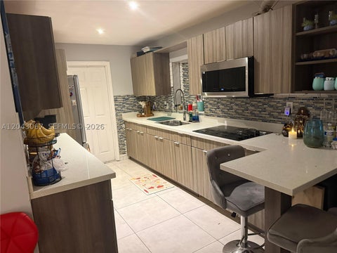 Tiny photo for 6717 Simms St, Hollywood, FL 33024 (MLS # A12043067)