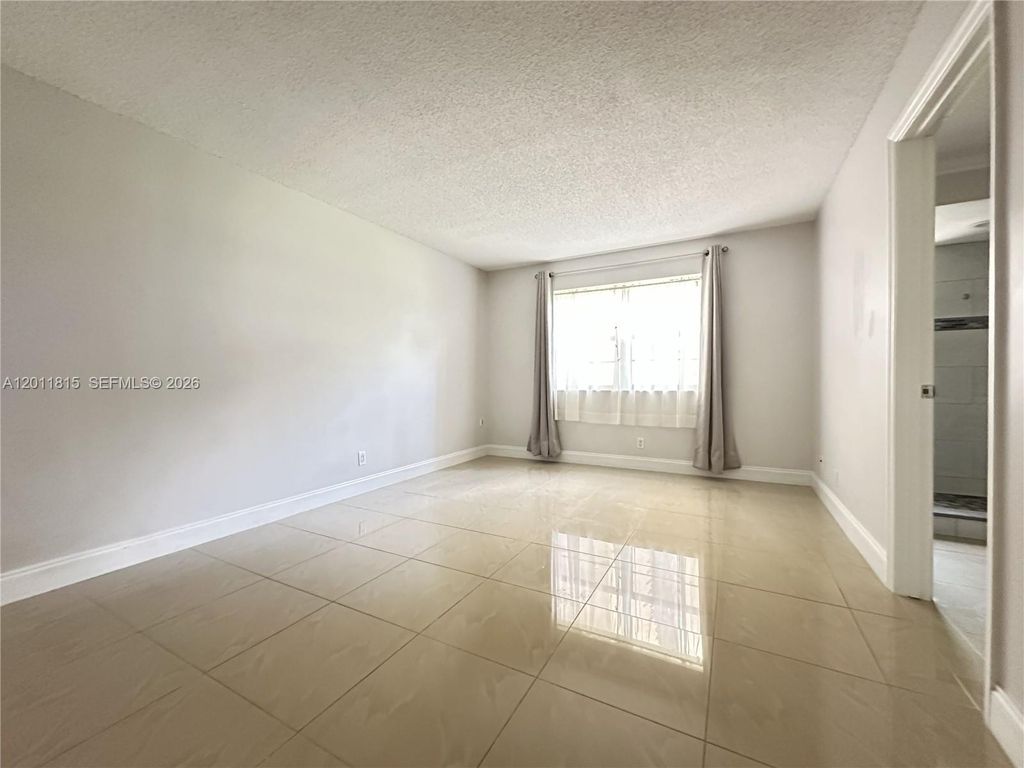 Photo of 9370 SW 8th St #107, Boca Raton, FL 33428 (MLS # A12011815)