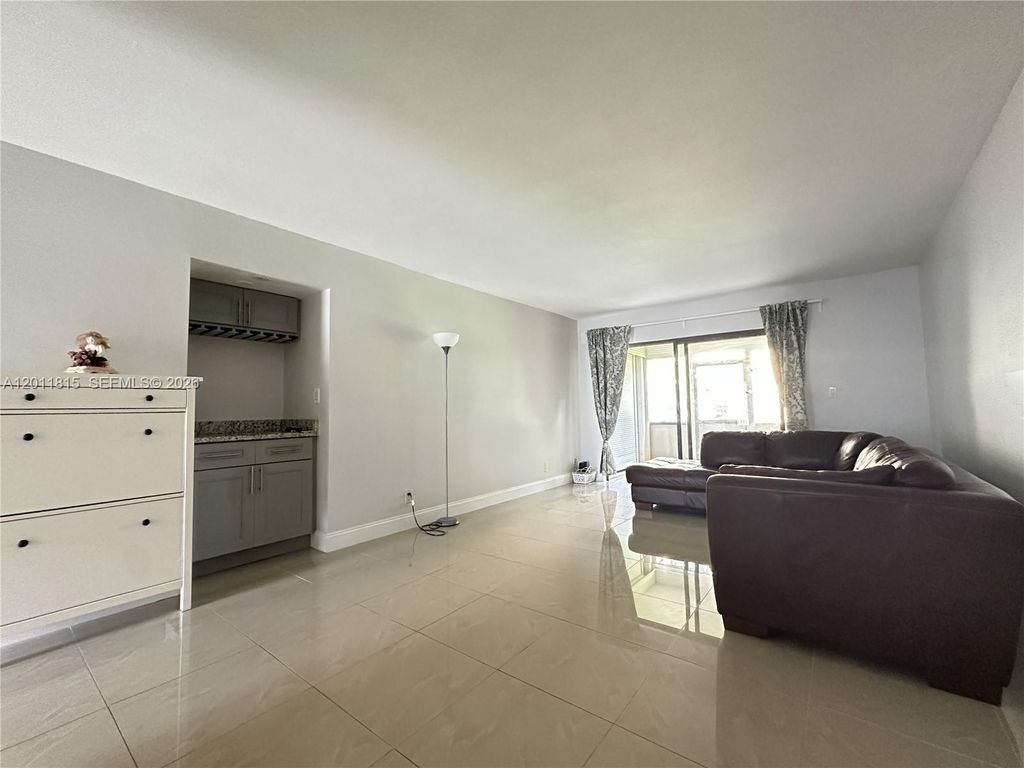 Photo of 9370 SW 8th St #107, Boca Raton, FL 33428 (MLS # A12011815)