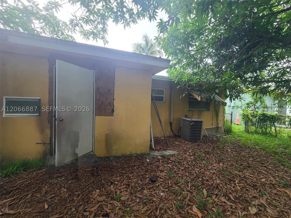 Photo of 5910 NW 16th Ct, Sunrise, FL 33313 (MLS # A12066887)