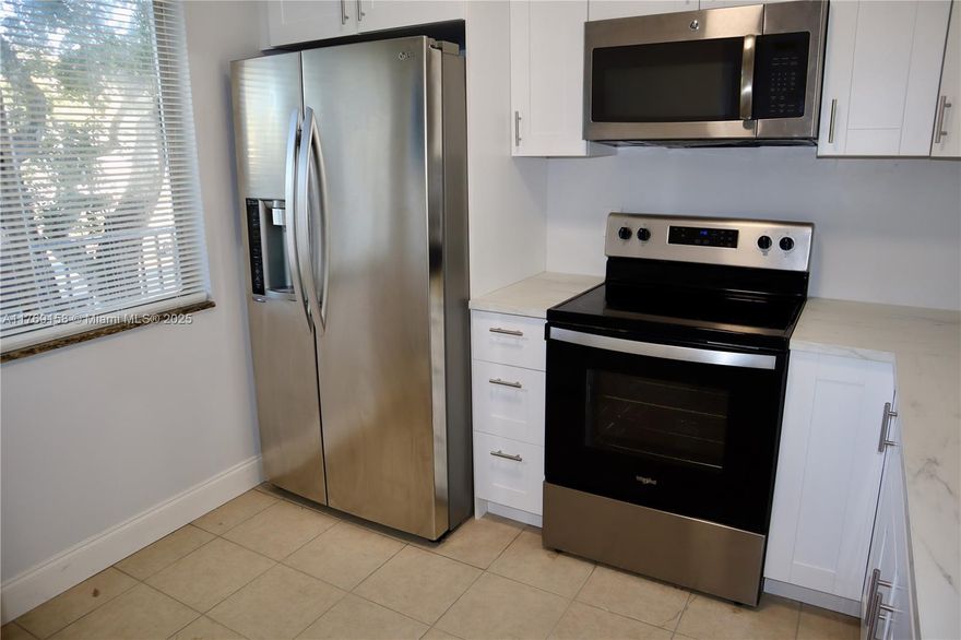 All Ages! Step into this newly renovated and spacious retreat, where modern upgrades meet comfort and convenience. This 2-bedroom, 2-bathroom condo with stackable washer and dryer, boasts a brand-new kitchen with stainless steel appliances, stylish new bathroom vanities and fixtures, and fresh flooring in the bedrooms. With new vertical blinds, a freshly painted interior, a walk-in closet, and an in-unit washer and dryer. Enjoy one assigned parking space, ample guest parking, a refreshing community pool, and more—all within a secure, gated community with 24/7 security and a low HOA. Prime location! Just minutes from top-rated schools, shopping centers, major highways, and public transportation, this home offers the perfect blend of style, convenience, and security.