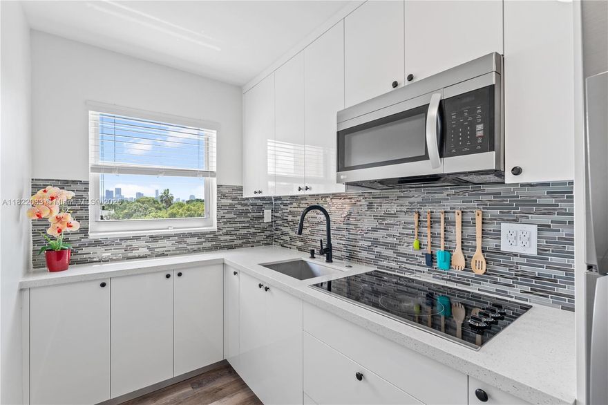 Completely remodeled 1-bedroom, 1-bath condo in the heart of Little Havana—just two blocks south of the iconic Calle 8. Take in panoramic views of Coral Gables, Coconut Grove, and the Downtown/Brickell skyline from your private balcony. This turn-key unit features a sleek modern kitchen and bathroom, stylish PVC flooring throughout, and a striking black porcelain accent wall in the living room. Fully furnished (if desired) and includes an assigned parking space. A move-in-ready gem in a vibrant, central location!