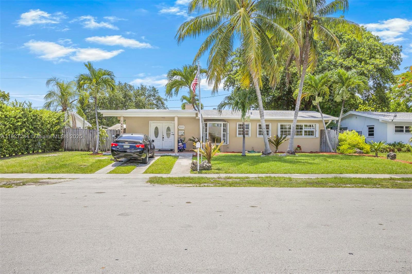 Charming and move-in-ready 3-beds, 2-bath home in a peaceful Cutler Bay neighborhood. bright open floor plan featuring elegant wood-look flooring, a cozy living room with a stone-accented fireplace, dining area and an updated kitchen with white cabinets, sleek counters, and a breakfast nook.Enjoy spacious bedrooms, modern bathrooms, and a large laundry room.The fully fenced backyard offers a covered patio, built-in grill, picnic area, lush lawn, mature trees, and a shed. Includes carport, circular driveway, and room for a boat or RV. Near schools, parks, shops, and highways.Check this out now!