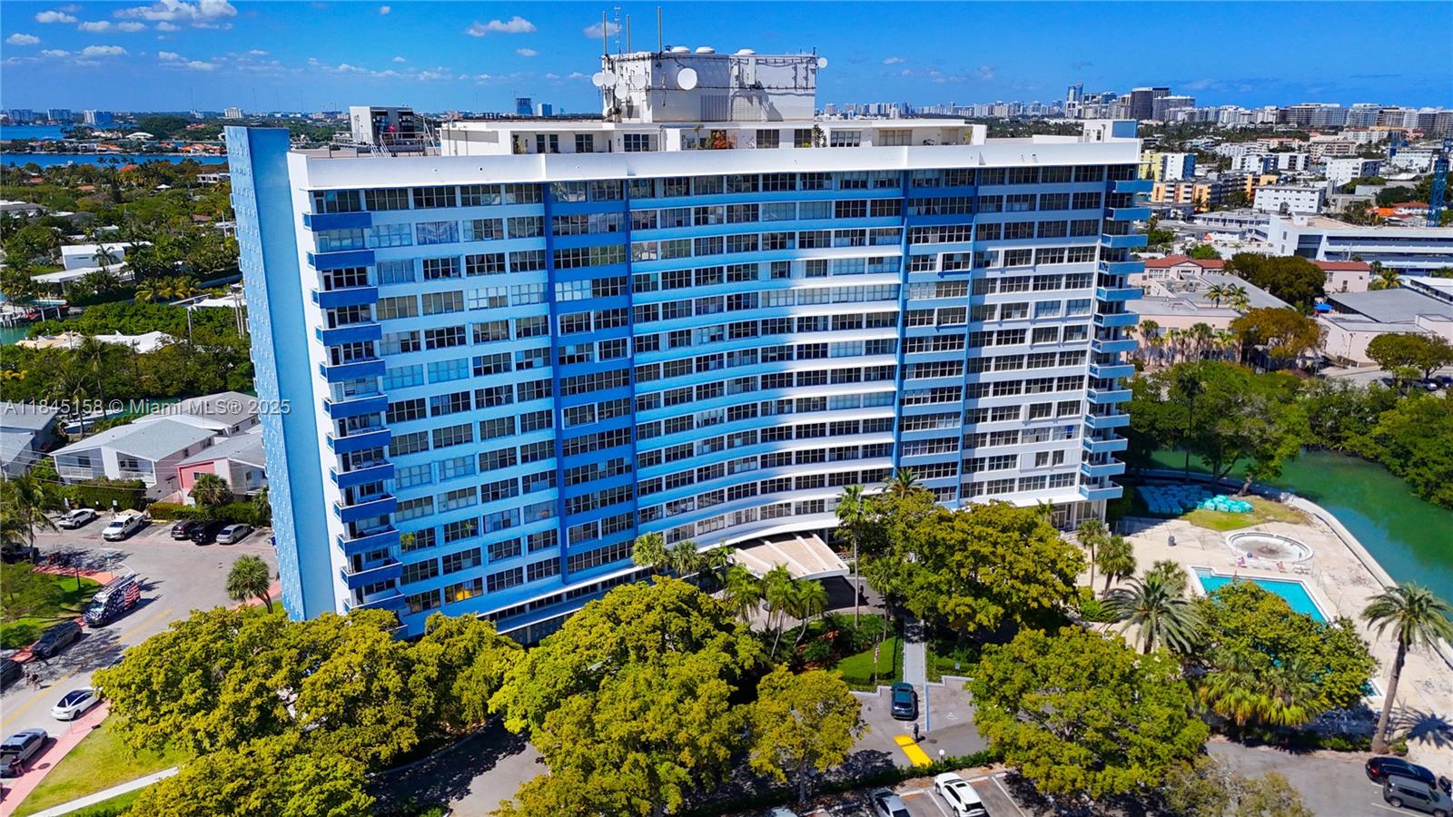 Bright 2 bed, 2 bath corner unit with panoramic views of Biscayne Bay, Edgewater, Downtown, Normandy Isle, and North Beach. Features brand-new kitchen appliances, updated countertops, tile floors, and plenty of storage—including a dedicated storage room. Impact windows and doors to be installed in August. Full-service building with 24/7 front desk, heated pools, gym, and event room. Includes 2 parking spaces (1 reserved). Located on peaceful Parkview Island, just a short walk to Normandy Isle shops and restaurants. Easy access to Miami Beach, MiMo, and Little River. Excellent nearby schools.