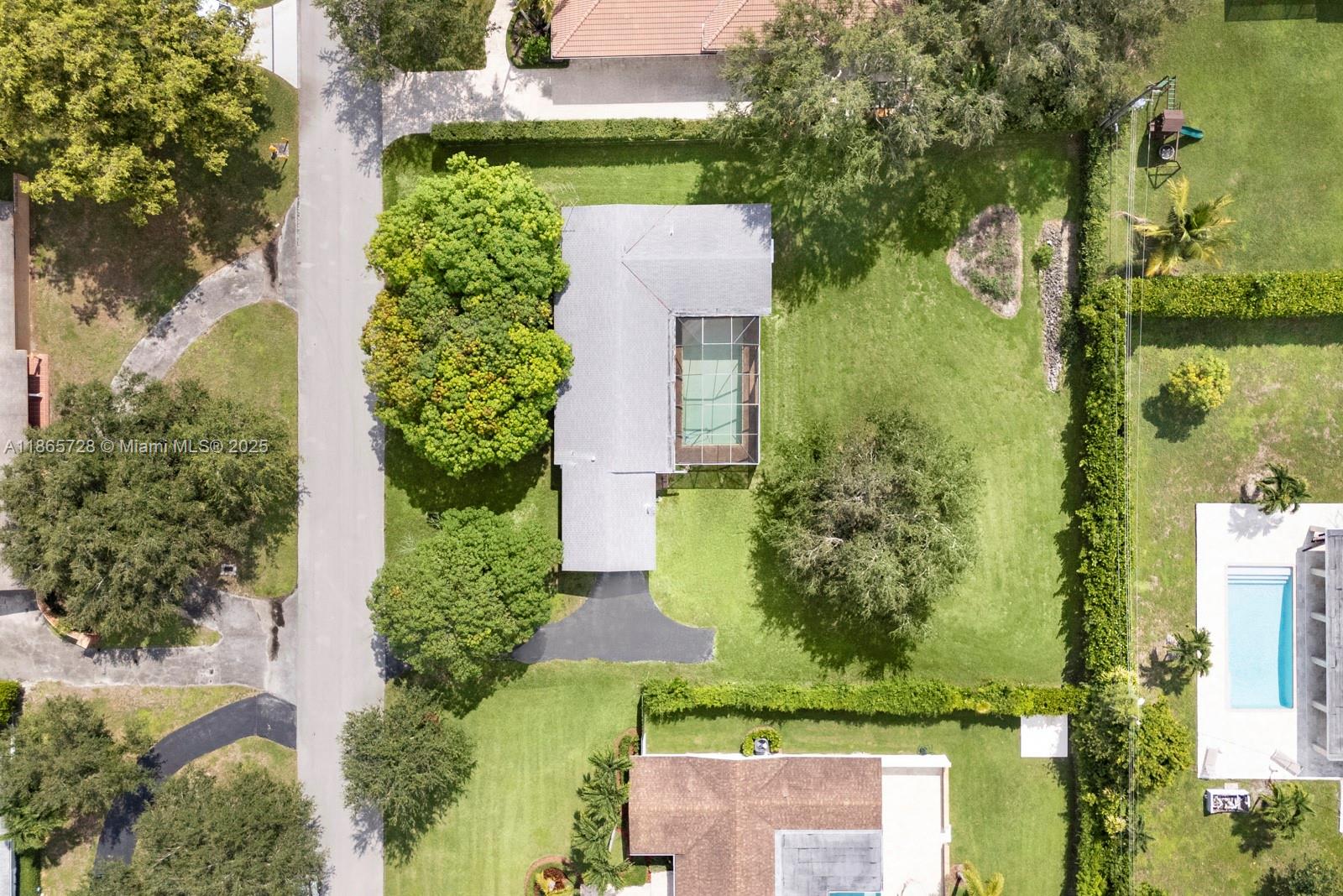 Amazingly well-located and nicely proportioned Pinecrest lot. Existing house will be properly demolished (along with septic tank abatement) and fully sodded and ready for someone to build a new house on by October-November of this year. Quiet street, Palmetto Elementary...great value for land!