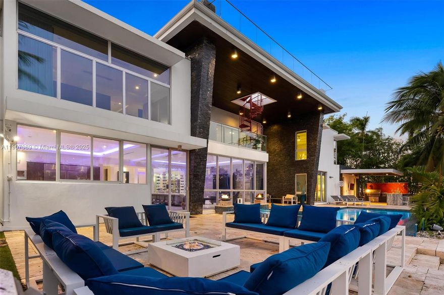 This spectacular modern waterfront residence is located in the highly desirable Las Olas Isles. This stunning property features include a red spiral staircase to the rooftop with views of the beach, ocean and city. Water frontage of 121 FT, dock, heated pool, jacuzzi, California kitchen area, pool table, fireplaces throughout; this home is an entertainer's dream. The kitchen features an island and upgraded appliances. This home has 2 Master bedroom suites, one downstairs and one upstairs. Rental price fluctuates based on season and availability. Shorter stays of one month or less welcome. This home comes completely furnished.