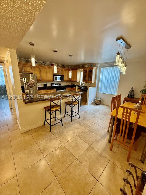 Photo of 20381 NE 30th Ave #320-7, Aventura, FL 33180 (MLS # A12008182)
