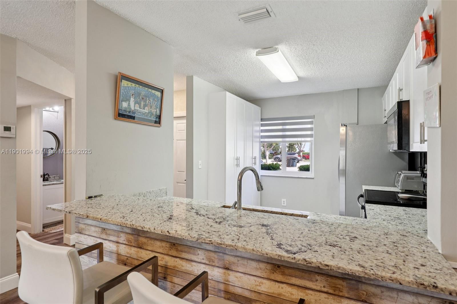 View photos, virtual tours, details... 20888 NW 1st St