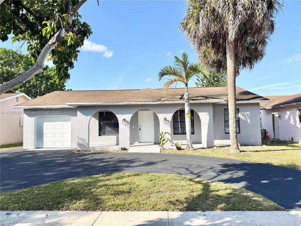 Photo of 11001 NW 20th Ct, Sunrise, FL 33322 (MLS # A11756037)