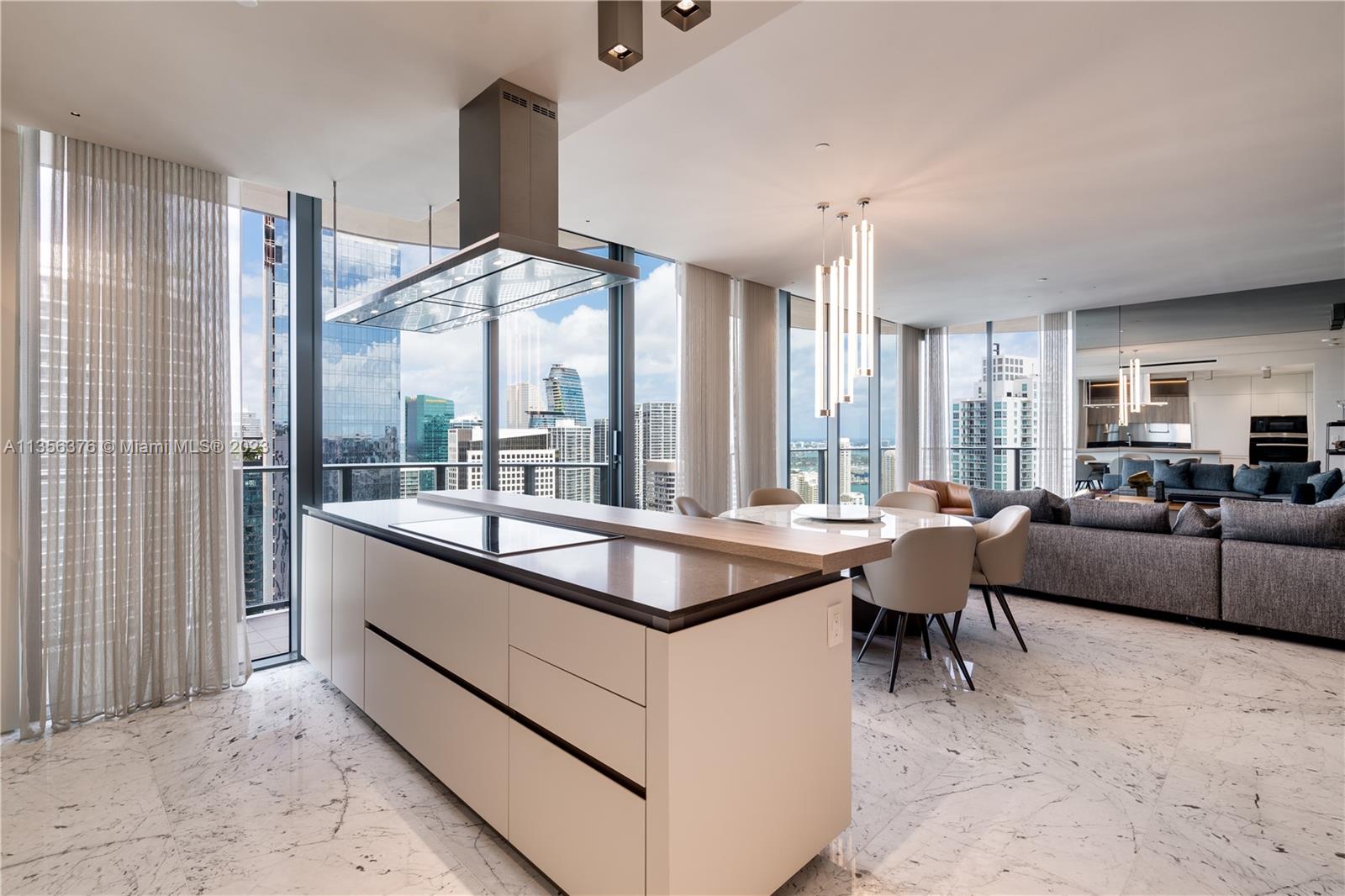 Live in ultimate luxury at this immaculate PH condo at the prestigious Brickell Flatiron. Fully customed unit comes complete with high-end finishes from marble flooring, top-of-the-line closets, a high-end lighting system, and an entertainment system, providing the ultimate level of comfort and sophistication. Wraparound balcony in the best line, facing northeast, offers a breathtaking of the city, bay, and beyond. Five-star amenities include; a state-of-the-art fitness center, rooftop and lap pool, spa, and much more! Located in the heart of Brickell, this condo offers easy access to some of Miami's finest dining, shopping, and entertainment options. This is the perfect choice for those seeking a luxurious and sophisticated home in a prime location! Furniture is negotiable.