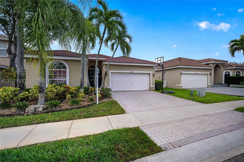 Photo of 11625 NW 48th St, Coral Springs, FL 33076 (MLS # A12079152)