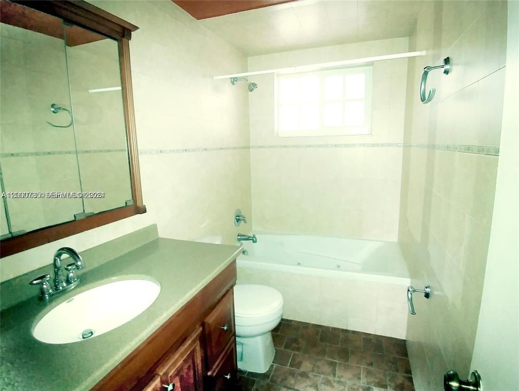 Photo of 462 Golden Isles Dr #205, Hallandale Beach, FL 33009 (MLS # A12000735)