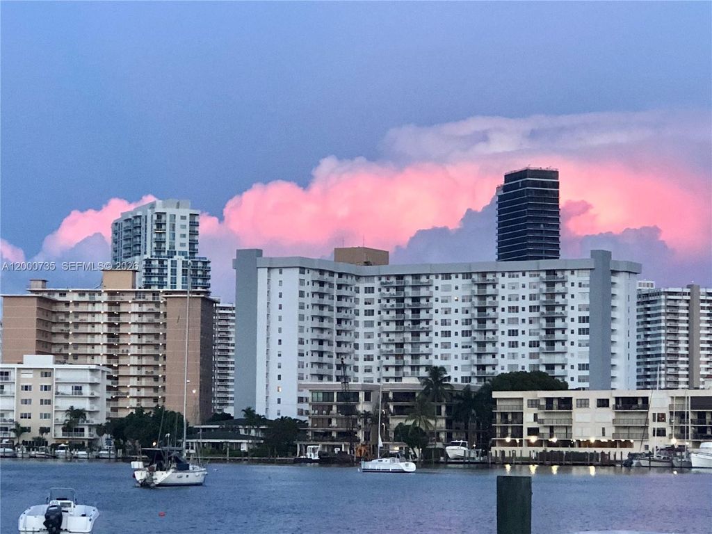 Photo of 462 Golden Isles Dr #205, Hallandale Beach, FL 33009 (MLS # A12000735)