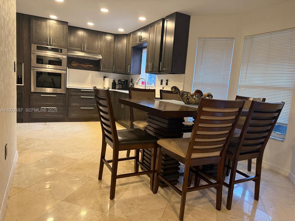 Photo of 233 E Forest Oak Cir, Davie, FL 33325 (MLS # A11922187)