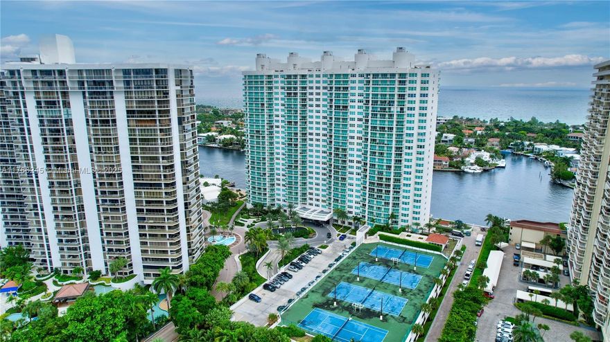 Enjoy Unobstructed Intracoastal And Ocean Views! Coveted "6" Line In Hamptons | Being Sold "As-Is"!  Spacious Split Floor Plan, Formal Dining Room or Den. Large Primary Suite & Lots Of Closet Space Including 2 Closets! 5-Star Resort Style Amenities: Pool With Huge Deck & Bbq, Gym, Media Rm, Library, Event Room, Enter Club House To The Second Pool On The Intracoastal, New Gym, Daily Aerobic Classes During The Week, Spa, Sauna, Nail Spa, Racquetball & Tennis Courts, Kids Room, Teen Room, Card Rm, Room Service, Full Movie Theater, Also Cafe With Outdoor Seating & Much More! *All Special Assessments Paid*