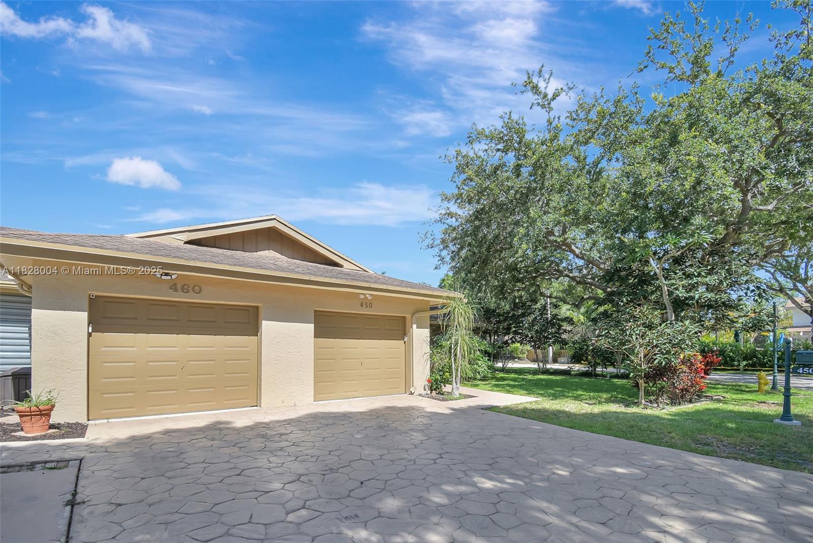 Rarely available Polynesian Villas opportunity! This true corner unit one story villa offers the privacy and feel of a single-family home with all the perks of maintenance-free living. Featuring 3 bedrooms, 2 bathrooms, and nearly 1,600 sq ft of living space, you'll love the open layout, neutral porcelain tile, and upgraded high-hat lighting. The oversized screened-in patio is perfect for relaxing or entertaining. Impeccably maintained by long-term owners, the home is mostly original—ready to enjoy or update to your taste. One of Plantation’s most sought-after communities, known for single-story villas with private 1-car garages. Just minutes from major highways and grocery stores and only moments to Plantation Walk, Midtown, parks, dining, live music and community events.