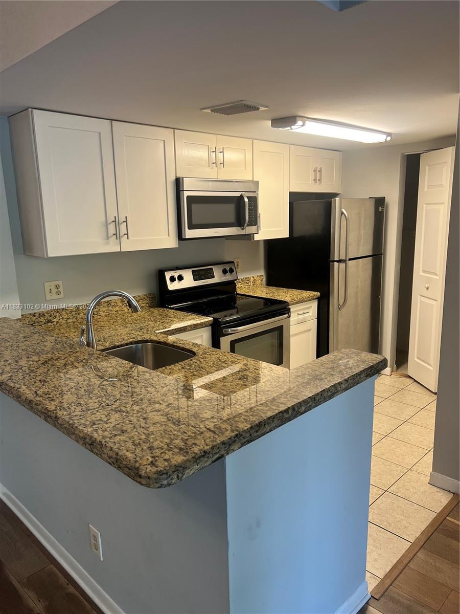 Beautiful and spacious 2 bedroom 2 bath condo with upgraded bathrooms, stainless steel appliance,
granite counter tops and washer and dryer. Club house facilitites include pool, tennis court, gym and an area for car washing. Supermarkets nearby and close to Sawgrass Mills Mall and highway 595.. Please submit Offer with proof of funds if cash and pre Approval if financed. Association requires a credit score of 600 for approval.