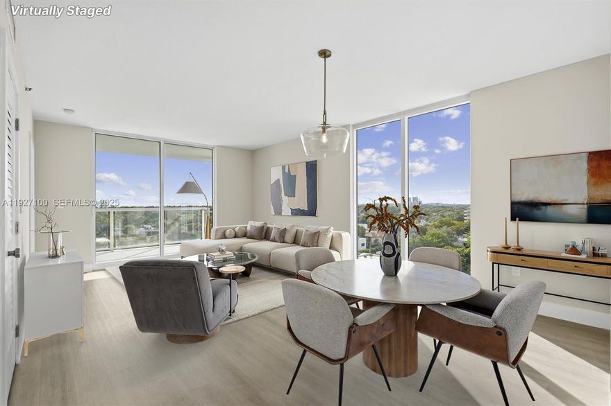 Magnificent, refined, beautifully reimagined! This residence delivers 180° of unobstructed west and southwest views, including the shimmering Biscayne Bay over Coconut Grove and the twinkling skyline beyond. Floor-to-ceiling windows and sliding glass doors flood the home with natural light and frame spectacular sunsets that elevate every moment of the day. Brand new flooring, cabinetry, appliances, and elegant quartz countertops. Every finish has been selected with intention and quality, creating a residence that is both modern and timeless. Be the very first to live in this fully renovated, pristine home. The craftsmanship is exceptional, offering a rare opportunity to enjoy luxury at an accessible value. Perfectly positioned between The Roads and Shenandoah, this boutique building on historic Coral Way offers unmatched convenience. Enjoy immediate access to public transportation and proximity to Mary Brickell Village, Brickell City Centre, Coconut Grove, Coral Gables, and Miami’s Financial District. The Miami Trolley provides effortless connections to Brickell, Bayshore Drive, parks, shops, and waterfront dining. Whether you seek walkability, lifestyle, or convenience, this location delivers it all. At this price, there is no better opportunity in the entire area. Act quickly. This exceptional home with it's covered parking and 2 storages won't last!